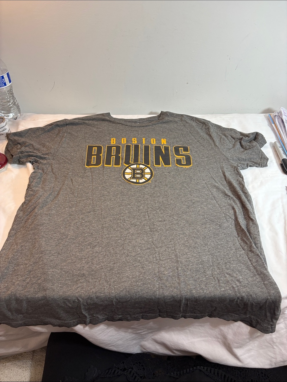 NHL Boston Bruins Gray and Yellow Short Sleeve Tee. 0191